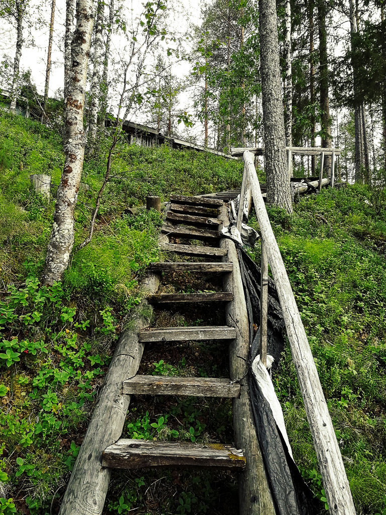 steep steps leading up to a summer cabin